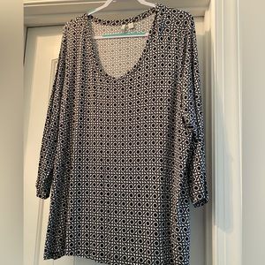 Black and white tunic top, with fun geometric pattern. 3/4 sleeves.
